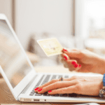 Early Amazon Prime Day Deals in June 2025: Save on Tech Buys Person using a laptop to shop online for tech deals.